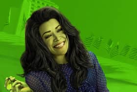 Tatiana Maslany as She-Hulk. She has green skin and big hair; the background behind her has a lime green wash over it (Credit: Marvel/Disney+)