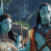 Ronal (Kate Winslet), Tonowari (Cliff Curtis), and the Metkayina Clan (Photo: © 2022 20th Century Studios)
