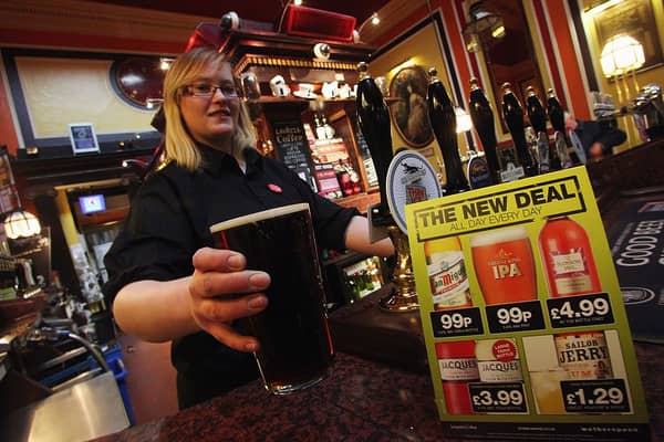 Wetherspoons 99p pints: pub chain will slash drink prices in November - with some beers costing under £1 (Photo by Matt Cardy/Getty Images)
