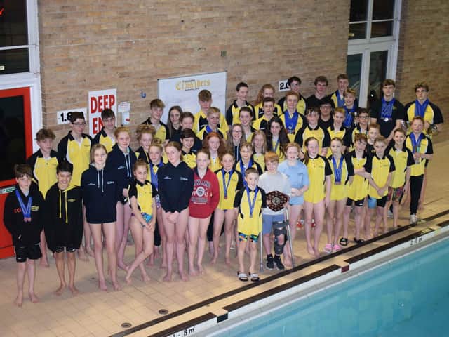 Linslade Crusaders swimmers with their county medals and trophies