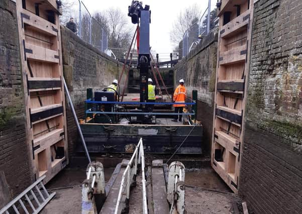Works going on to replace the bottom gates at Leighton Lock