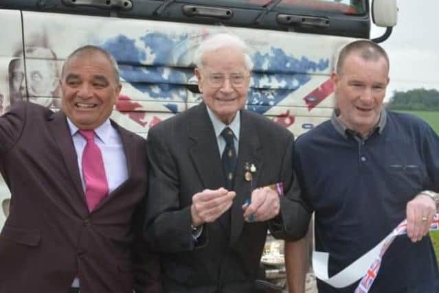 Wally (middle) at the Truck Convoy in 2018 with Billy Bryne (left) from BBC DIY SOS and Lee Rigby's father Phil McClure (right). Credit: Dunstable and Leighton Buzzard Truck Convoy.