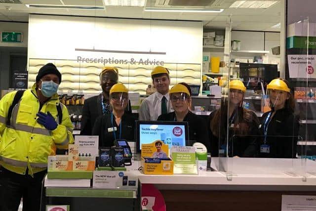 Lloyds Pharmacy staff with their new visors