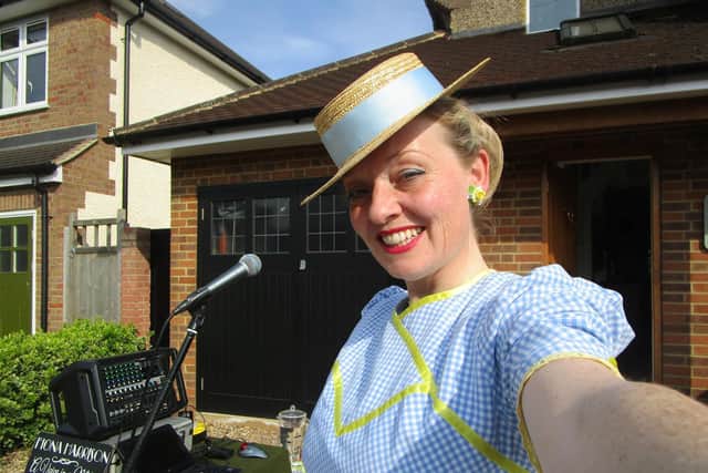 Fiona has been keeping her neighbours' spirits up by singing on her driveway