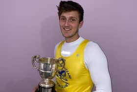 Charlie Smith with the Dexter Cup, awarded for the best U23 performance at the National Championships