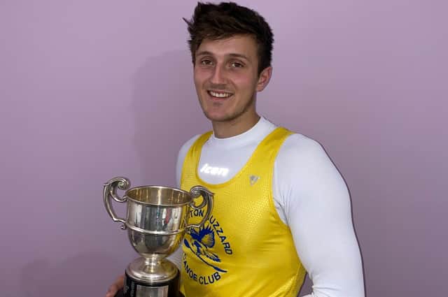 Charlie Smith with the Dexter Cup, awarded for the best U23 performance at the National Championships