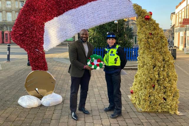 The PCC with his wreath and PCSO Carne. Photo: Bedfordshire Police.