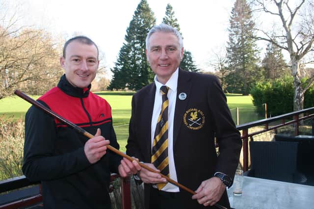 Drive-in competition winner Dean Oakley with new captain Graham Freer at Leighton Buzzard Golf Club