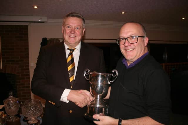 Grand Prix winner Howard Allen (right) receives his  trophy from Immediate Past Captain Simon Rossiter at Leighton Buzzard Golf Club