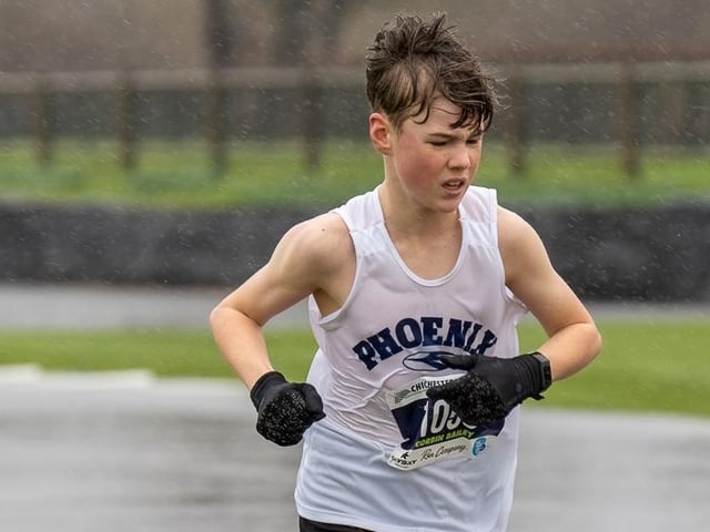 Action from the Chichester PB 5k at Goodwood, held on Sunday morning in wind and rain / Pictures: Trevor Staff and Lyn Phillips