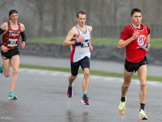 Action from the Chichester PB 5k at Goodwood, held on Sunday morning in wind and rain / Pictures: Trevor Staff and Lyn Phillips
