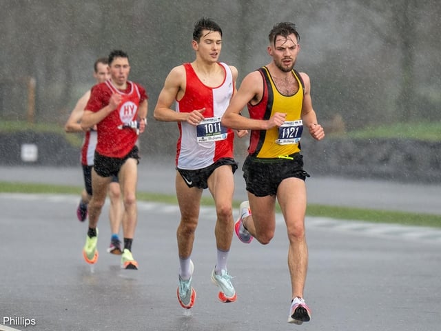 Action from the Chichester PB 5k at Goodwood, held on Sunday morning in wind and rain / Pictures: Trevor Staff and Lyn Phillips