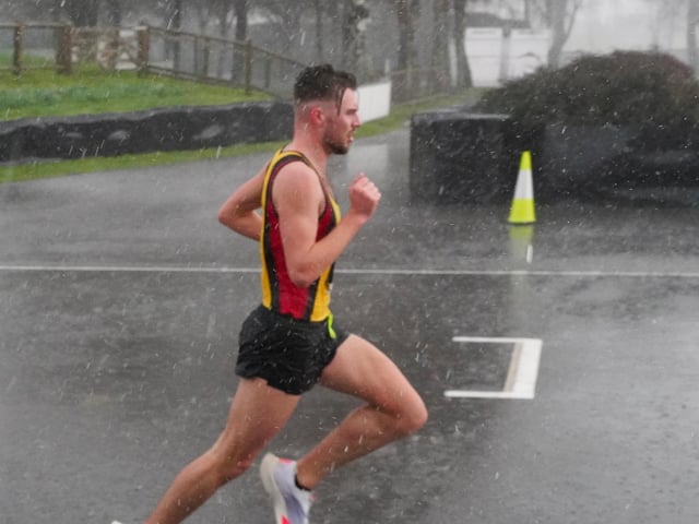 Action from the Chichester PB 5k at Goodwood, held on Sunday morning in wind and rain / Pictures: Trevor Staff and Lyn Phillips