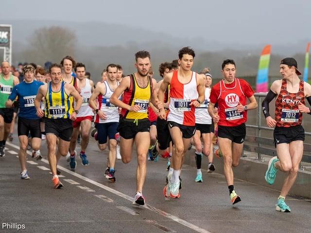 Action from the Chichester PB 5k at Goodwood, held on Sunday morning in wind and rain / Pictures: Trevor Staff and Lyn Phillips
