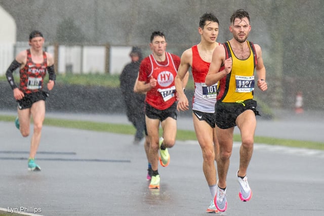 Action from the Chichester PB 5k at Goodwood, held on Sunday morning in wind and rain / Pictures: Trevor Staff and Lyn Phillips