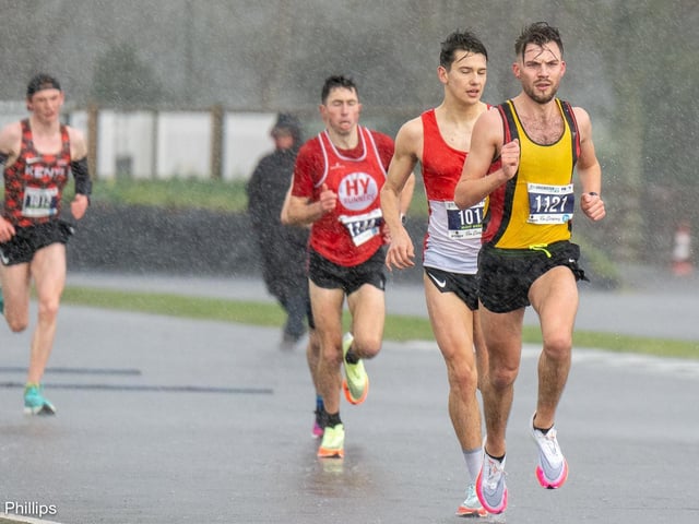 Action from the Chichester PB 5k at Goodwood, held on Sunday morning in wind and rain / Pictures: Trevor Staff and Lyn Phillips