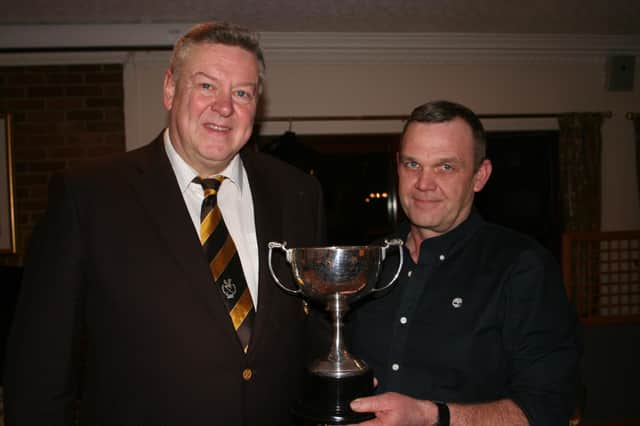 Immediate past captain Simon Rossiter presenting Declan Shannon with Henley Cup at Leighton Buzzard Golf Club
