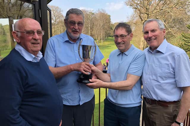 Seniors’ Captain Andrew Macdonald presents the Spencer Cup to winner Kevin O’Donoghue, with runner-up Geoff Allatt (left) and third-placed John Tarbox (right).