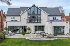 Stunning modern home with a summer house and outdoor kitchen complete with bar