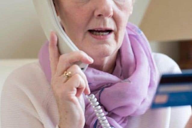 Elderly residents are being given phones with an inbuilt scam calling blocker