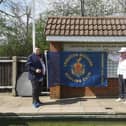 Leighton Buzzard Bowling Club President Stuart Espie and Club Chairman  Roger Clarke with the new flag to mark the centenary