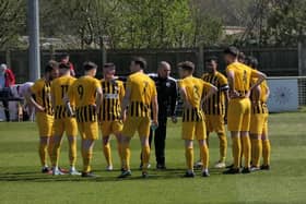 Joint manager Joe Sweeney with the team at Cobham for their FA Vase game in April (Picture by Andrew Parker)