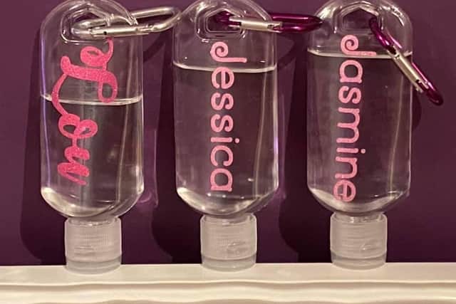 Mini personalised bottles with a carabiner – ideal for hand sanitiser