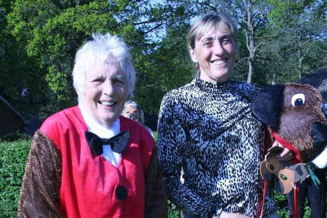Captain Sandra Carter with her Vice Captain Lesley Bednarek and pet golden retrievers Beth and Tilly