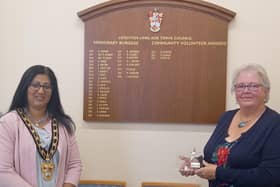 Rose Gunter receives a 2021 award from the Mayor