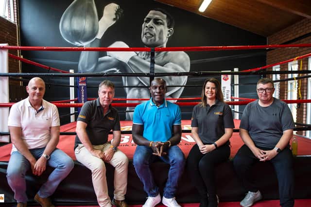 Frank Bruno Foundation Chief Executive Nick Smith, Buttle’s Managing Director Ian Church, Frank Bruno, Buttle’s Commercial Manager Hannah Brunton, and Frank Bruno Foundation Chief Operations Officer Brandon Eldred. CREDIT: Kirsty Edmonds