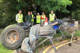Volunteers with the recovered waste