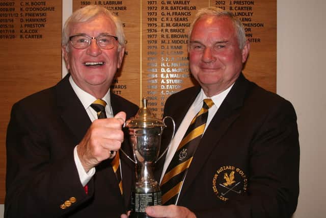 An annual competition for former Captains of Leighton Buzzard golf club has been won by Yorkshireman John Preston with 37 points.
John, pictured (right)  receiving the trophy from Immediate Past Captain Robbie John, was Club Captain in 2012, succeeding David Hawkins, who was runner-up with 34 points. Both went on to be Presidents of the Plantation Road club, like third-placed 1993 Captain Kevin O’Donoghue, who finished with 33 points.