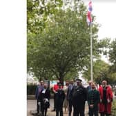 Emergency Services Day Flag Raising Ceremony with (L to R) Mohammed Nawaz (Councillor for Kempston Central & East Ward and Deputy Speaker of Bedford Borough Council); Eric Masih (High Sherif), Leon Meredith (Midshires Search and Rescue); Alison Kibblewhite (Assistant Chief Fire Officer); Councillor Lucy Bywater (Bedford Borough Council); Mohammad Yasin MP (Bedford and Kempston); Garry Forsyth (Chief Constable); Michael Headley (Bedford Borough Council); Tom Barker (East of England Ambulance Service); Dave Hodgson (Mayor of Bedford Borough).