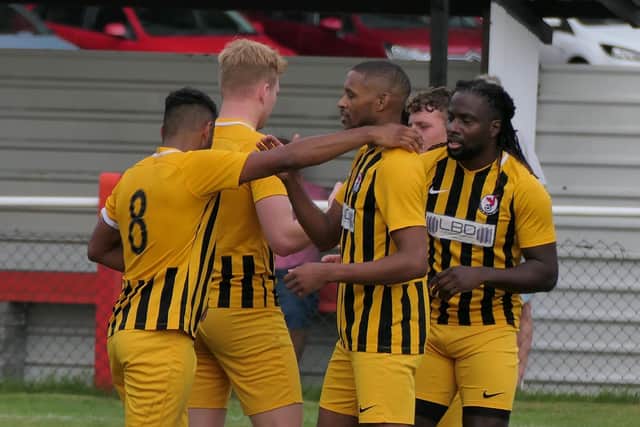 Celebrations for Ashton Campbell's hat-trick against Tring Athletic