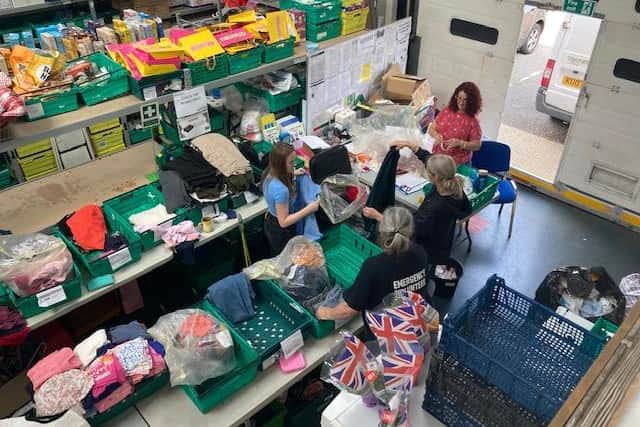 The Leighton-Linslade Helpers sorting clothes for refugees. June said: "We have filled our transit van 12 times over.  This is the last lot of sorting to be carried out.  We have distributed four van loads to hotels in Luton.  The rest will be stored once sorted and called off by local authorities for use."