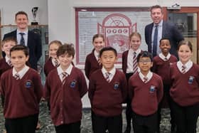 Celebrations at Linslade School! Head of School Phil Stock (left) and Headteacher Mark Gibbs pictured with pupils. Image: Linslade School.
