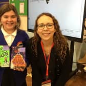 Children’s author, Lou Treleaven, pictured with a pupil from Beaudesert Lower School