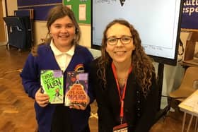 Children’s author, Lou Treleaven, pictured with a pupil from Beaudesert Lower School