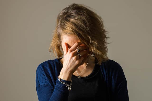Stock photo shows woman with depression. PRESS ASSOCIATION Photo.