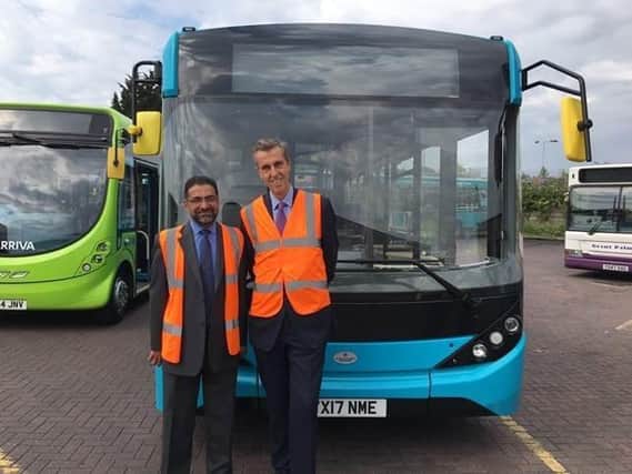 Andrew Selous MP, celebrating more funding for buses in Central Bedfordshire