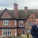 Simon Cartwright outside the 17th-century Grade II-listed home which features in the upcoming Monkhouse film. Picture: Simon Cartwright / SWNS