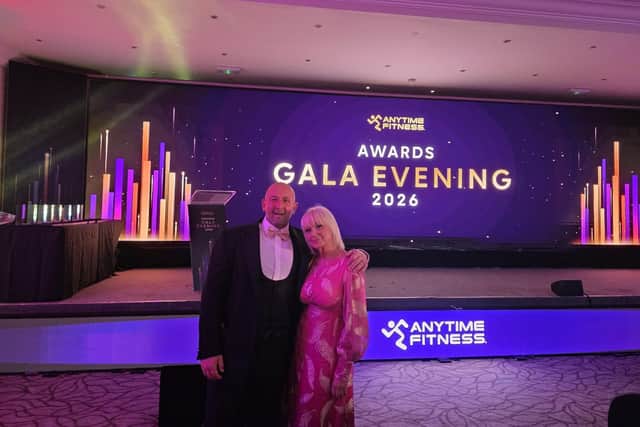 Neil with his wife, Donna, when he received an award for a charity walk. Image supplied by: Neil Mills.