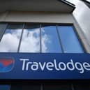 Signage on a Travelodge hotel  (Photo by BEN STANSALL/AFP via Getty Images)