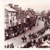Leighton Buzzard High Street, 1902, when the town was celebrating the coronation of Edward VII and the end of the Boer War. Image: Leighton Buzzard and District Historical and Archaeological Society/Keith Burchell.