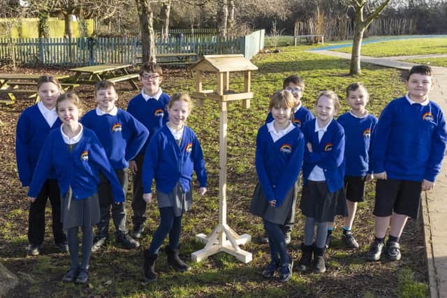 Beaudesert Lower School pupils with their new bird table 