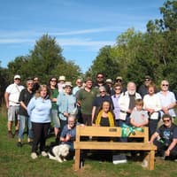 Commemorative bench unveiled to mark 20th anniversary of Friends of Linslade Woods