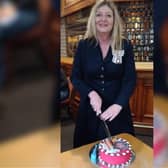 Susan Lousada, the HM Lord-Lieutenant for Bedfordshire cutting the special cake made by Sarah Miceli from "For Heaven's Cake"