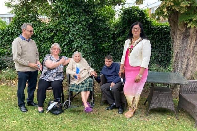 The Richardson family with Elm Lodge resident Isobel (pictured centre) enjoyed chatting to Cllr Farzana about life at Elm Lodge. Image: Elm Lodge.