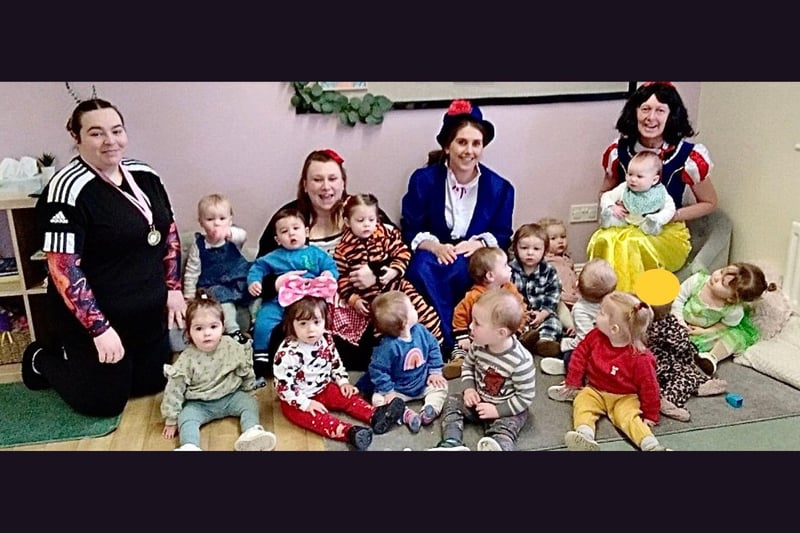 Aristotots Day Nursery's Caterpillar and Ladybird children aged 0-2 years old all dressed up for World Book Day along with their teachers