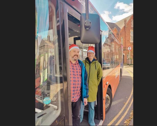 Town councillors Jo Symes and Andrea Kidd celebrating the free Christmas buses. Image: Leighton Buzzard Lib Dems.